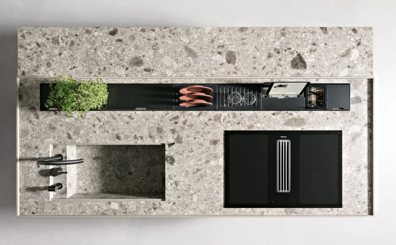 Overhead view of stone kitchen worktop with sink and hob